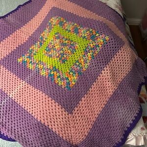 Beautiful crocheted blanket little discolored one side